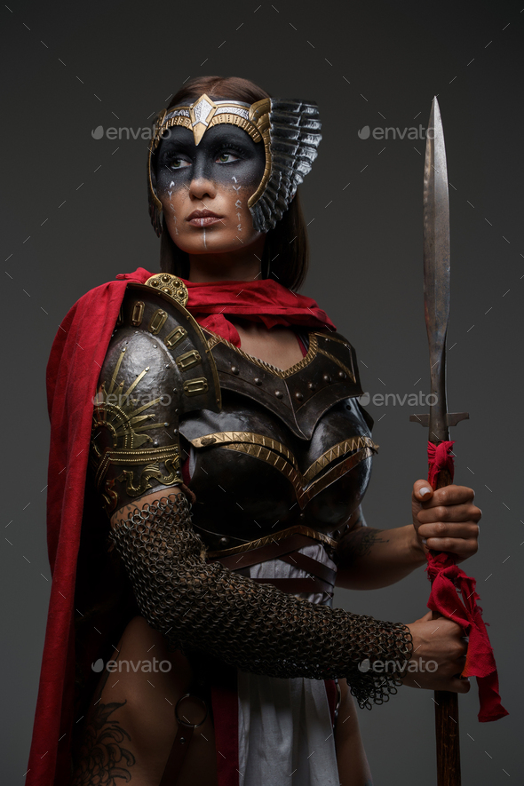 Female Warrior With Spear Dressed In Red Cloak And Armor Stock Photo By