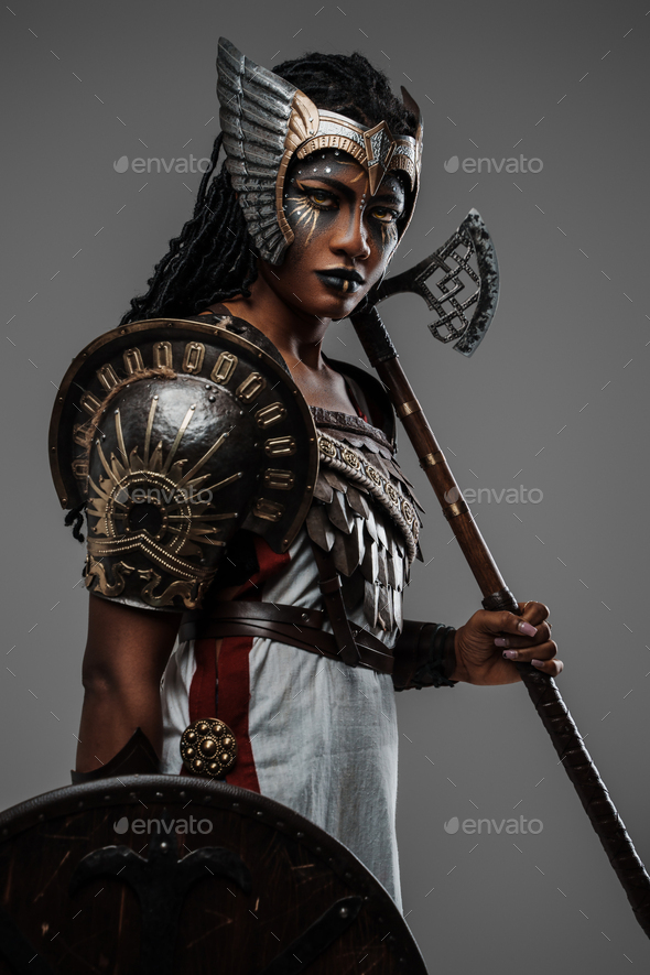 African Woman Amazon With Shield And Axe Dressed In Armor Stock Photo