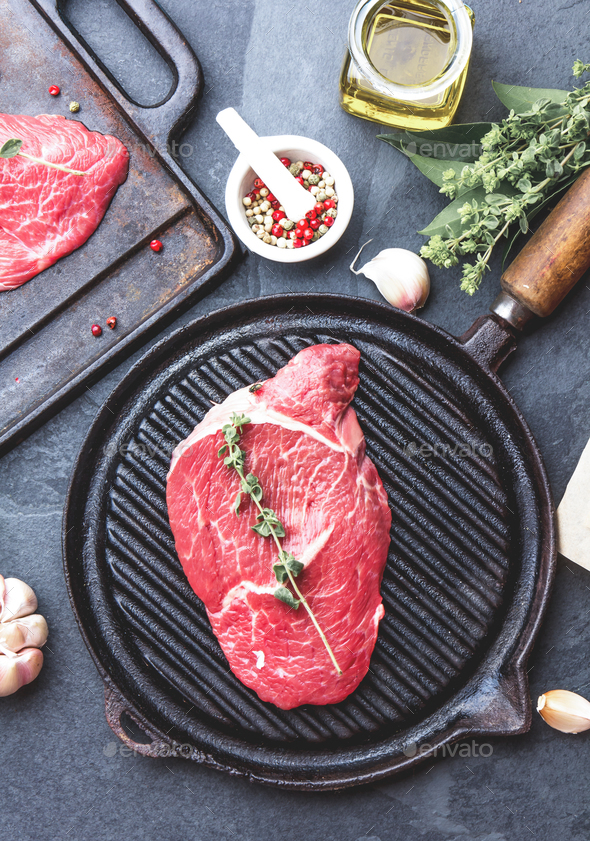 Fresh Raw Meat Beef Tenderloin And Marbled Beef Steaks On Grill Pan