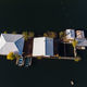 Aerial View Of A Floating House In Vacha Dam Devin Municipality