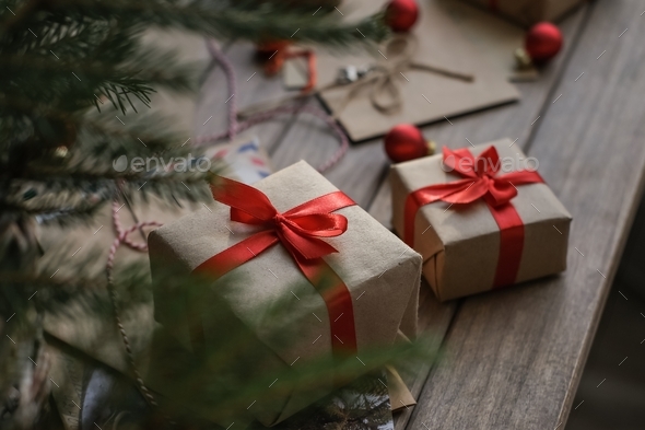 Christmas Gifts Packed In Kraft Paper And Red Ribbon Christmas Gift