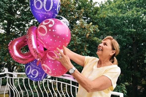 Mature Woman Celebrating Her 60th Birthday Stock Photo By David Tanke