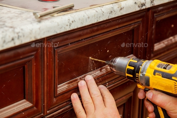 Installation Of Furniture Hinges On The Cabinet Door Master Drills The