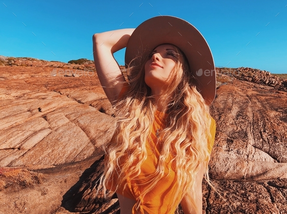 Beautiful Girl With Long Hair Wearing Hat At The Beach Stock Photo By