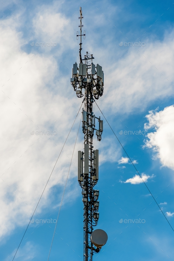 Radio Communication And Cell Tower On Blue Sky Background Stock Photo