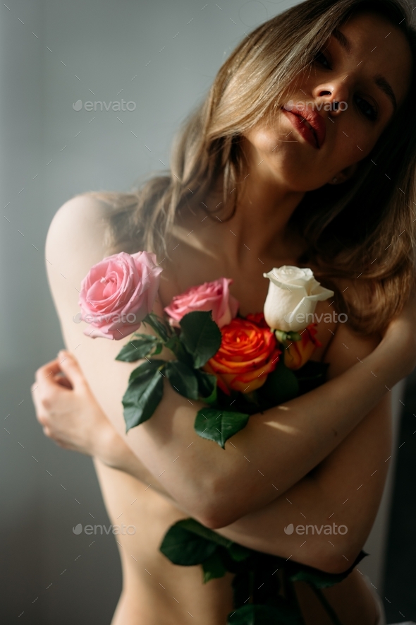 Beautiful Woman Nude With Flowers Rose Stock Photo By NickBulanov