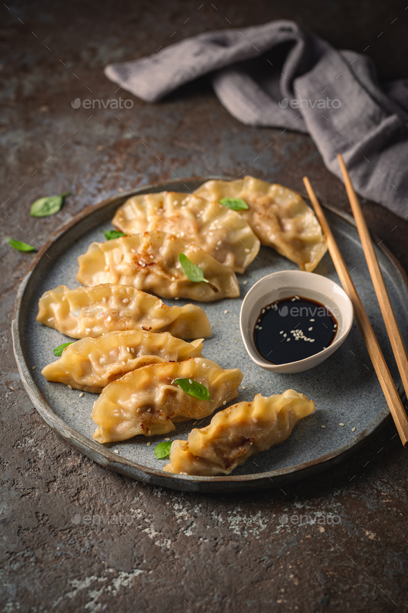 Asian Dumplings With Soy Sauce Stock Photo By Ipolly Photodune