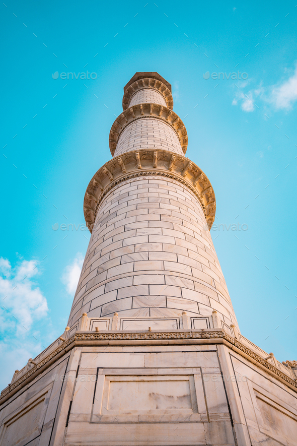 Low Angle Of The Minaret Of The Taj Mahal Mausoleum Under The Blue Sky