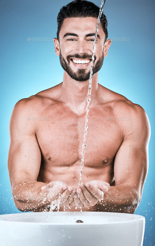 Portrait Water Splash And Man Cleaning Hands In Studio Isolated On A