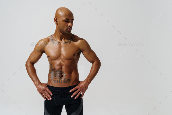 Portrait Of Attractive Sporty Man With Muscled Naked Body On White