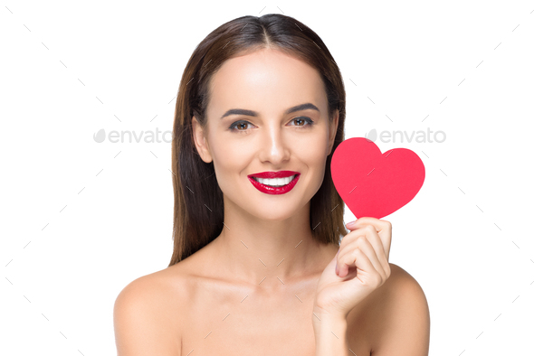 Cheerful Naked Woman Holding Red Heart Symbol And Smiling At Camera