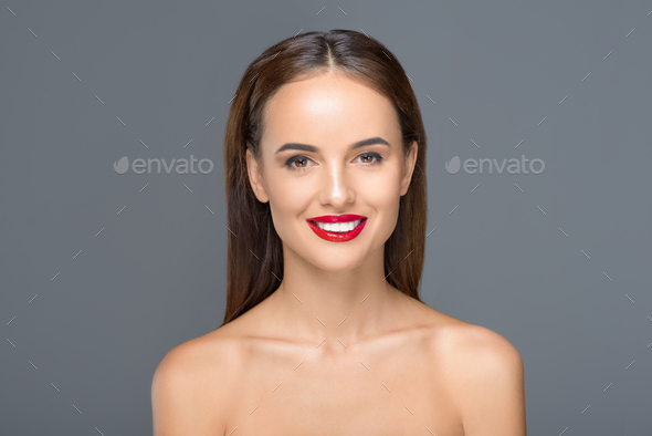 Portrait Of Beautiful Naked Woman Smiling At Camera Isolated On Grey