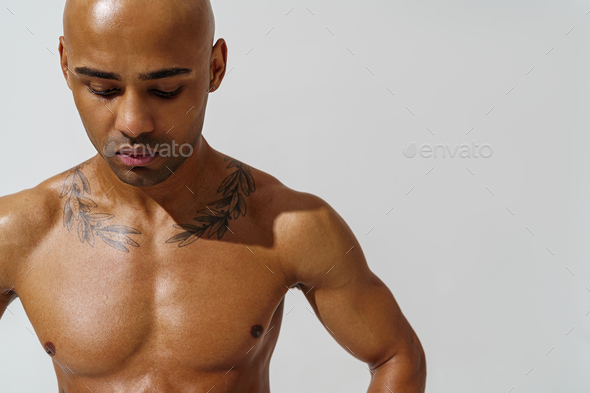 Portrait Of Attractive Sporty Man With Muscled Naked Body On White