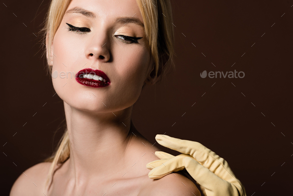 Hand In Yellow Glove Touching Sensual Naked Blonde Girl Isolated On