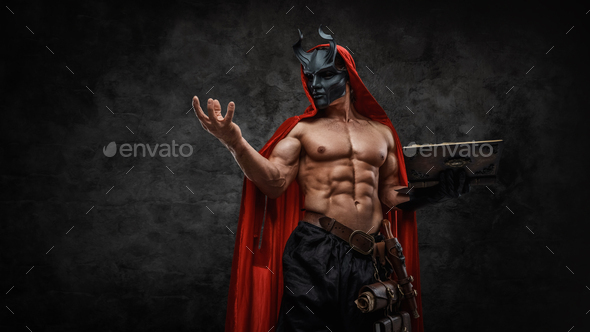 Wizard With Naked Torso And Cape Against Dark Background Stock Photo By