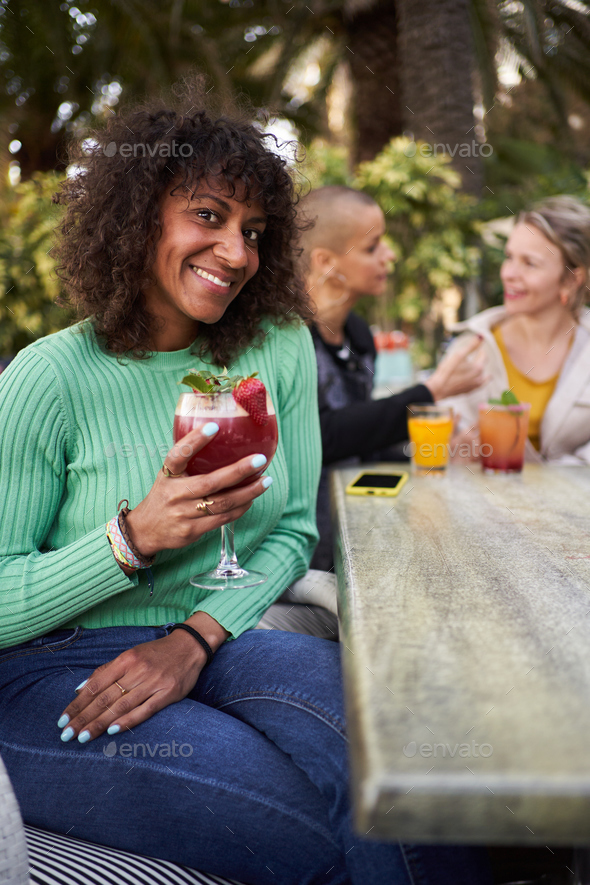 Cheerful Portrait Of Beautiful Brazilian Mature Woman Outside Gathering