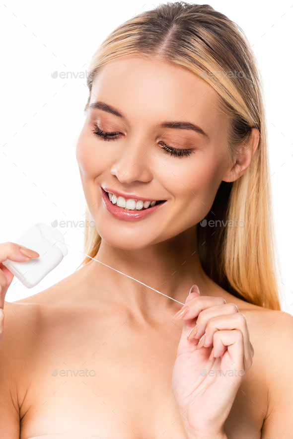 Portrait Of Smiling Naked Woman With Dental Floss Isolated On White