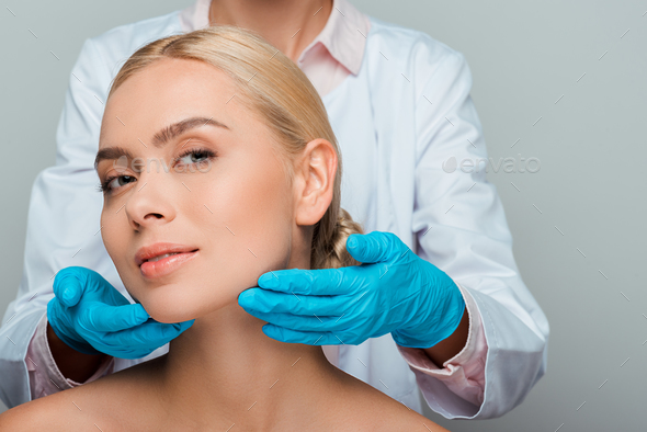 Cropped View Of Beautician In Blue Latex Gloves Touching Neck Of Naked