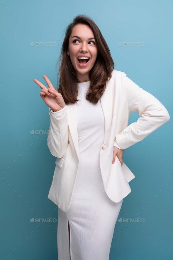 Vertical Portrait Of A Brunette Woman In An Elegant Dress With A