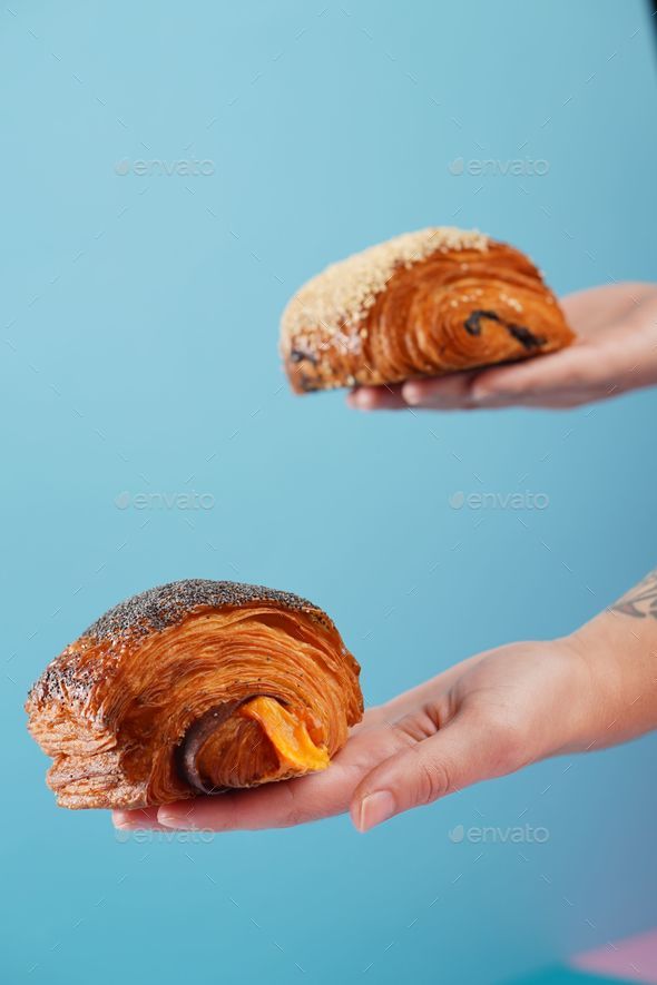 Freshly Baked Delicious Croissant On Display In A Person S Hand On A