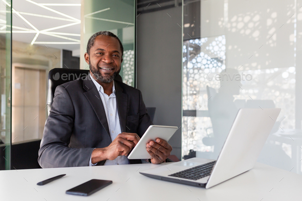 Portrait Of Successful African American Businessman Inside Office Boss