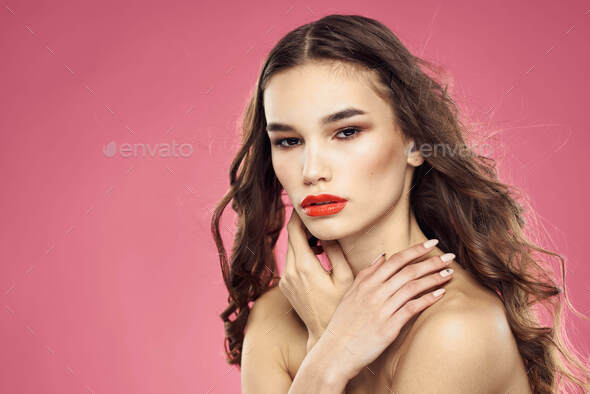 Beautiful Woman With Red Lips On A Pink Background Nude Shoulders