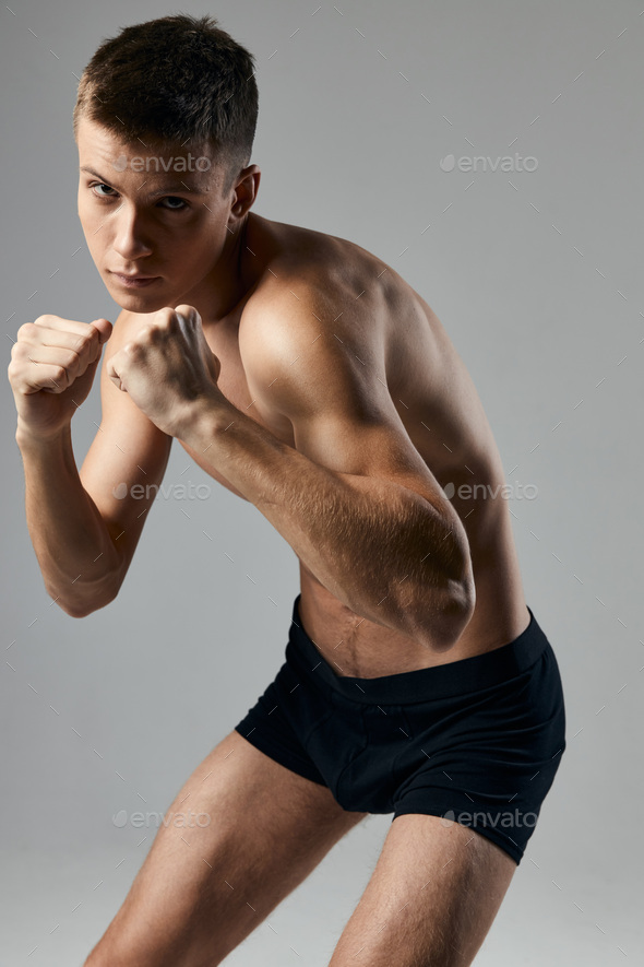 Boxer On A Gray Background Naked Torso Bodybuilder Fitness Stock Photo