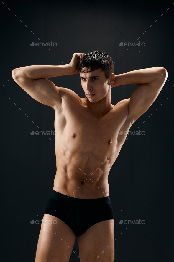 Man Inflated Naked Body In Dark Panties Posing Isolated Background