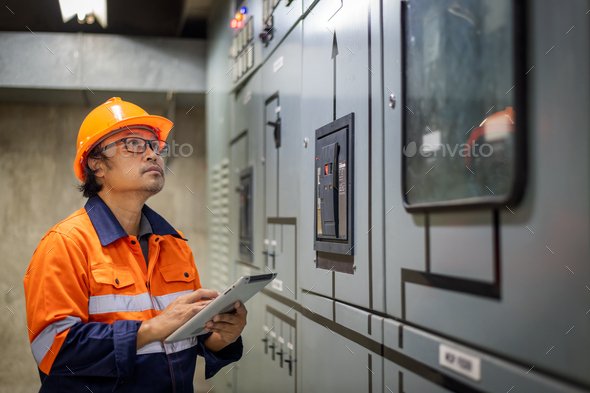 Engineer Checking And Inspecting At Mdb Panel He Working With Electric