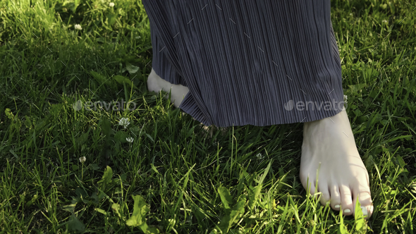 Close Up Of Woman Walking Barefoot On Green Grass Concept Beautiful