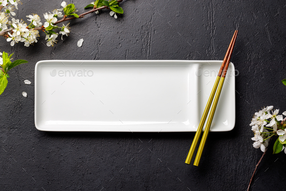 Table Adorned With Cherry Blossom Branch And Chopsticks Epitomizing