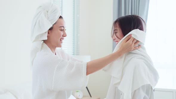 Asian Beautiful LGBTQ Lesbian Couple Drying Girlfriend S Hair After