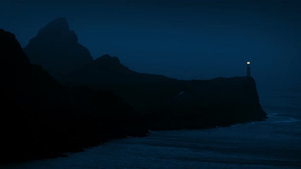 Lighthouse On Rocky Coast At Night Stock Footage VideoHive