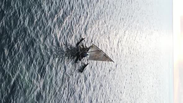 Vertical Video Boats in the Ocean Near the Coast of Zanzibar Tanzania Aerial View alt