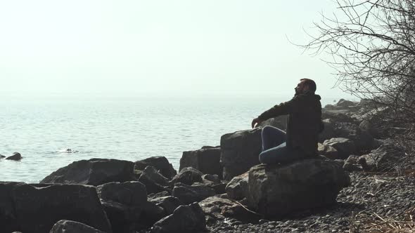 Pensive Man at the Seaside