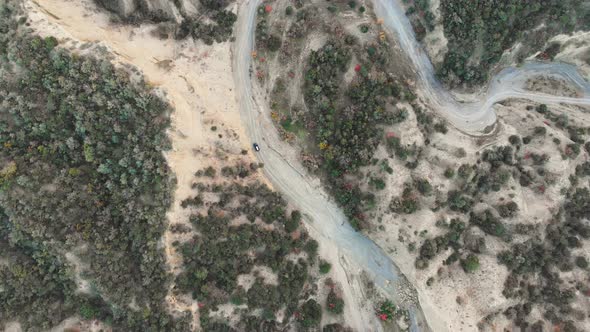 Static Overhead View Of Car On Standing In Deserted Landscape