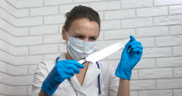 Medical Worker with Sharp Knife alt
