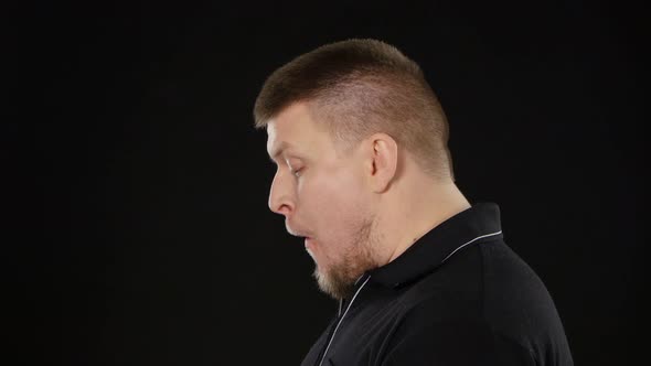 Adult Man Eating Hamburger alt