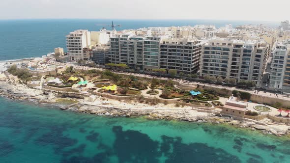 Aerial Clockwise Shot Of Exile Bay in Sliema Malta alt