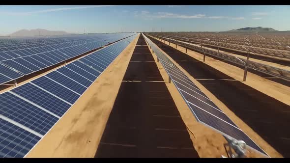 Solar panel . aerial view. A solar power plant located in a valley. SolarPlant Construction alt