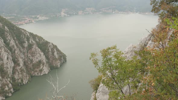 Danube river gorge and mountain Miroc cliffs slow tilt 4K 2160p 30fps UltraHD footage - Natural bord alt