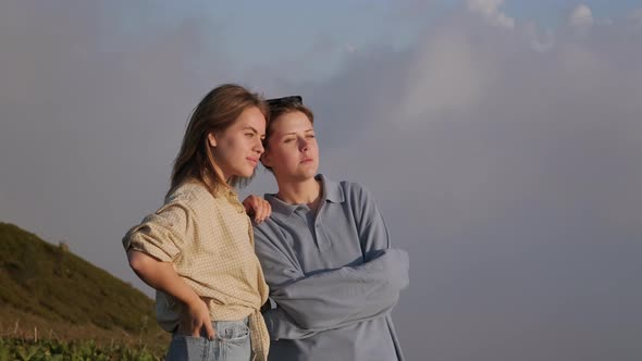 Teens Girls at Nature are Chatting Cheerfully alt