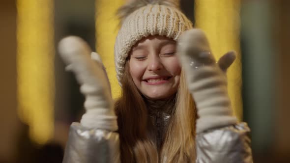 Cheerful Charming Girl Opening and Closing Eyes with Hands in Slow Motion alt