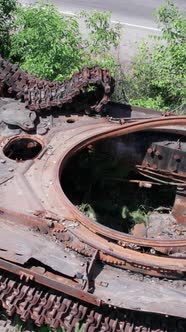 Vertical Video of a Burnt Military Equipment During the War in Ukraine alt