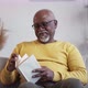Home Leisure Senior Man Enjoying Reading - VideoHive Item for Sale