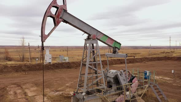 Pump Jack in Vast Oil Fields in Russia alt