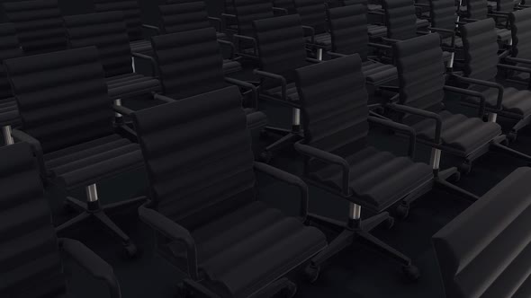 Multiple Desk Chairs In A Row Isolated In Dark Background Hd alt