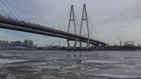 Timelapse of Ice Movement Along the River Under a Cablestayed Bridge