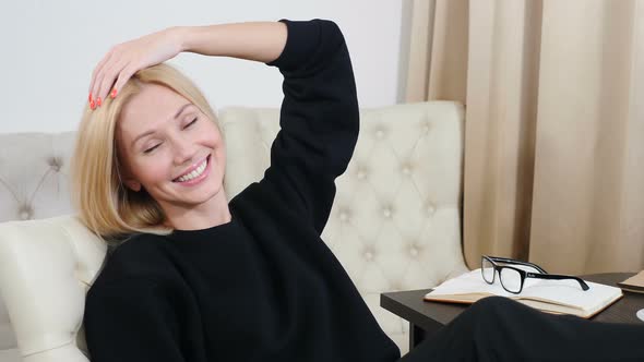 Portrait of Young Business Woman in Hotel Room alt