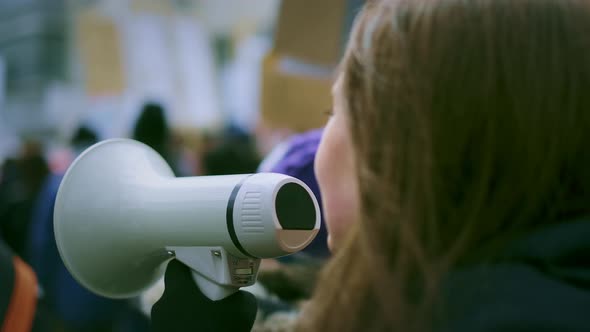 Girl with Megaphone Walk Scream. Woman Shout Loudspeaker. Fight Protest Strike. alt